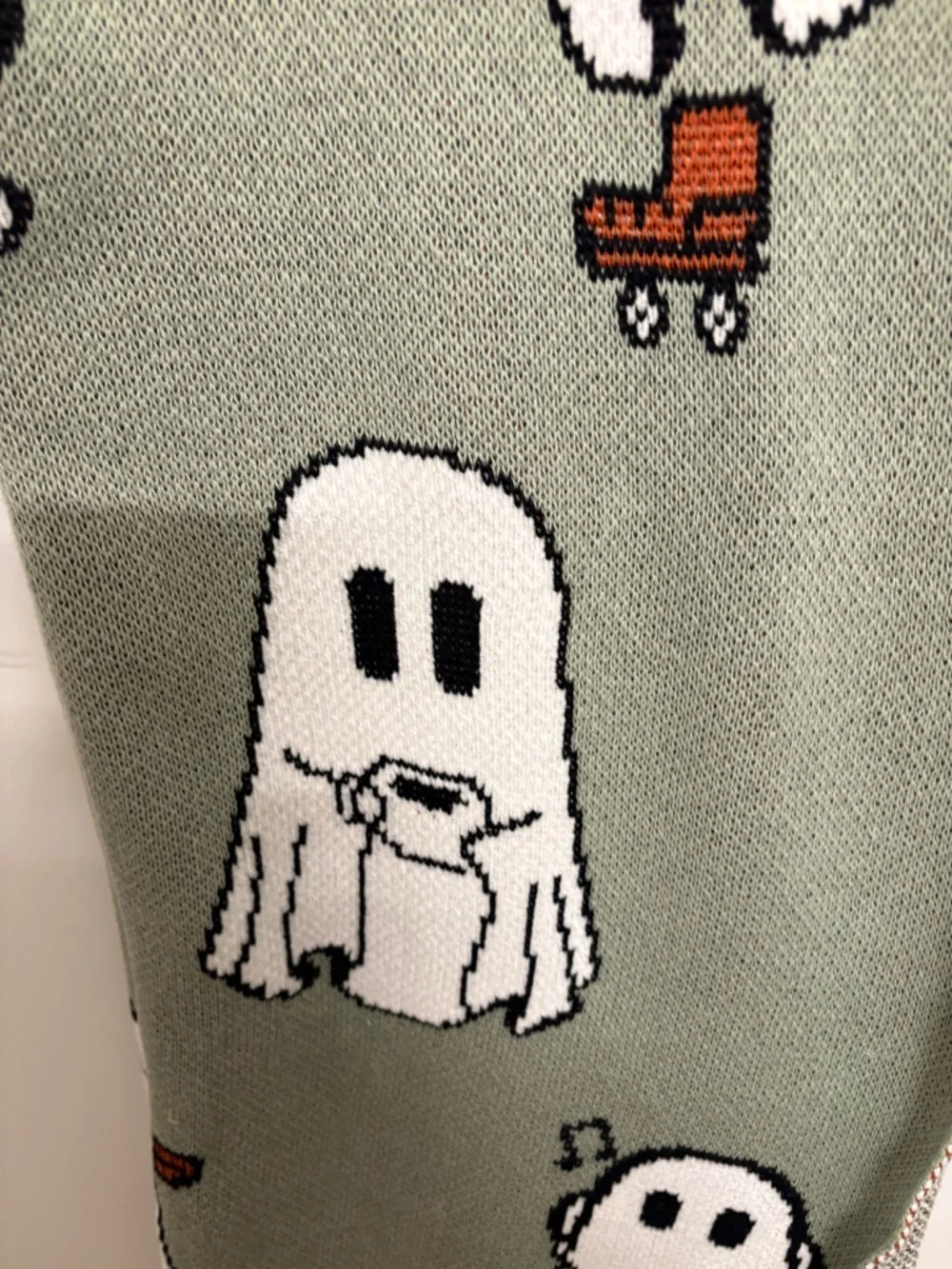 VIRAL Goblin & Ghoul Ghost Decorative Throw - Sage Green skates, coffee, music